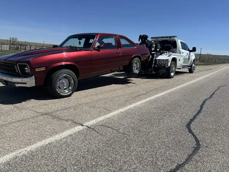 Classic Chevy Nova towed carefully by Hooked Up Towing and Recovery in Wyoming
