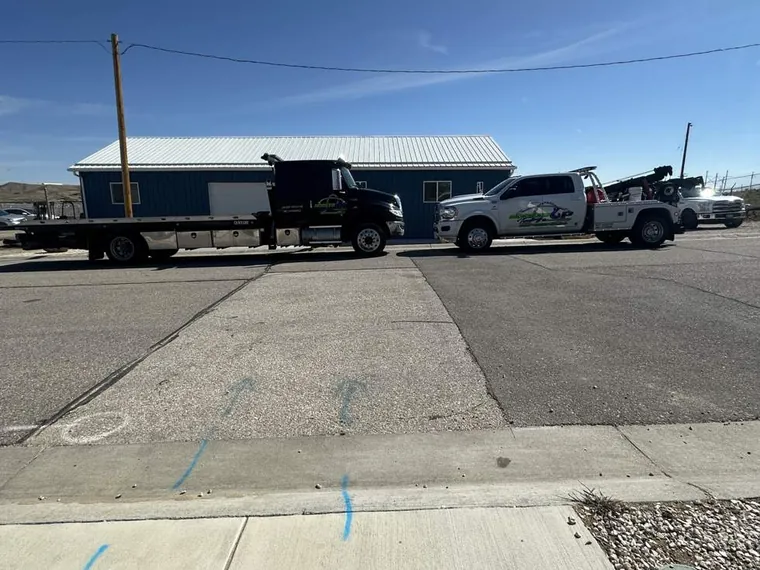Hooked Up Towing and Recovery fleet — flatbed and wrecker tow trucks in Casper, Wyoming